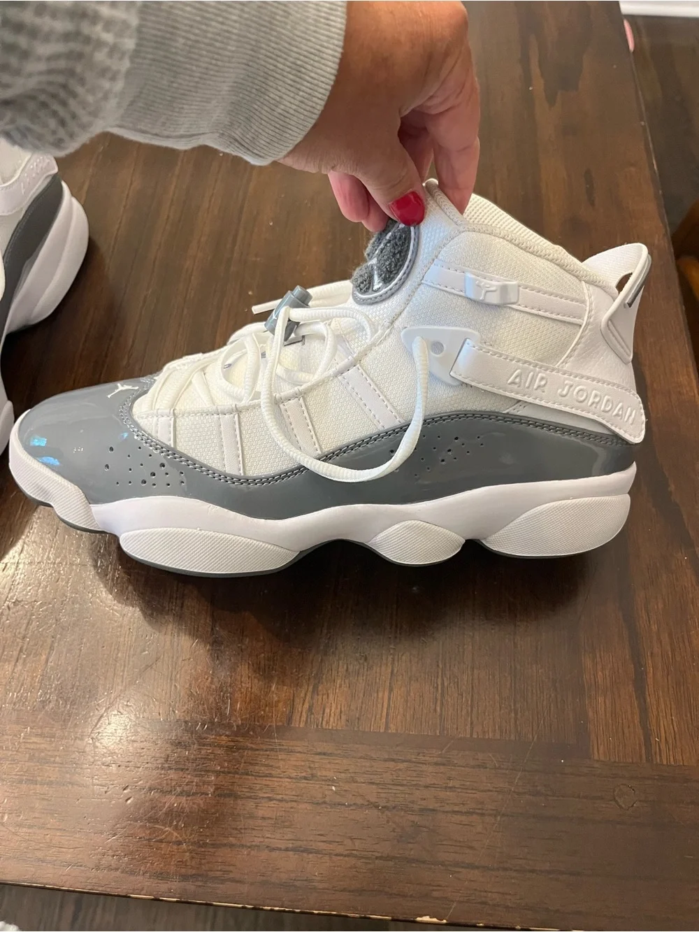 Jordan Kids High-Top Sneakers in White and Grey Patent